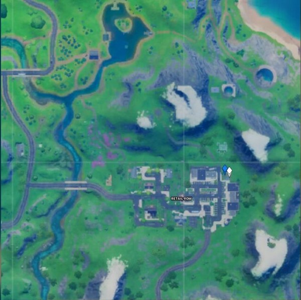 emplacement tyrolienne entre Retail Row et Steamy Stacks dans Fortnite